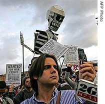 Anti-Bush protesters take part in a demonstration in Sydney, 04 Sept 2007