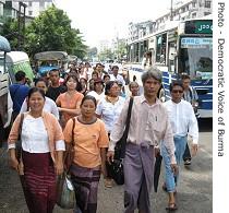 Demonstrators march through Rangoon to protest over massive fuel price hikes, 22 Aug 2007 