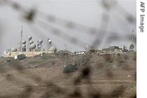 A picture taken from the Quneitra checkpoint shows an Israeli military station in the Israeli-occupied Golan Heights, 06 September 2007