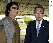 U.N. Secretary-General Ban Ki-moon, right, talks to Libya's leader Moammar Gadhafi in Sirte, east of Tripoli