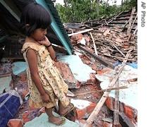 A local girl at her house destroyed by earthquake in Bengkulu, Sumatra island, 13 Sep 2007
