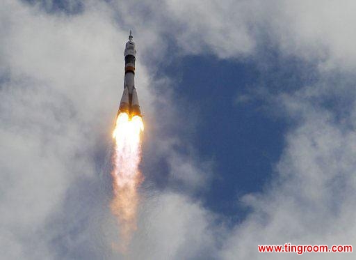 The Soyuz-FG rocket booster with Soyuz TMA-05M space ship carrying a new crew to the International Space Station, ISS, flies in the sky at the Russian leased Baikonur cosmodrome, Kazakhstan, Sunday, July 15, 2012.