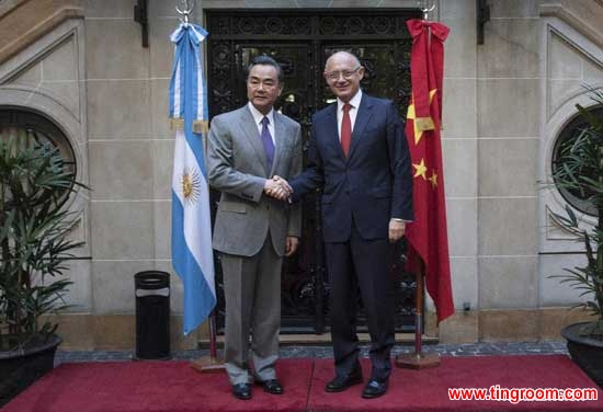 Chinese Foreign Minister Wang Yi (L) shakes hands with Argentinian Foreign Minister Hector Timerman at the Palace of San Martin, headquarters of the Argentine Foreign Ministry, in Buenos Aires, capital of Argentina, on April 23, 2014. (Xinhua/Martin Zabala)