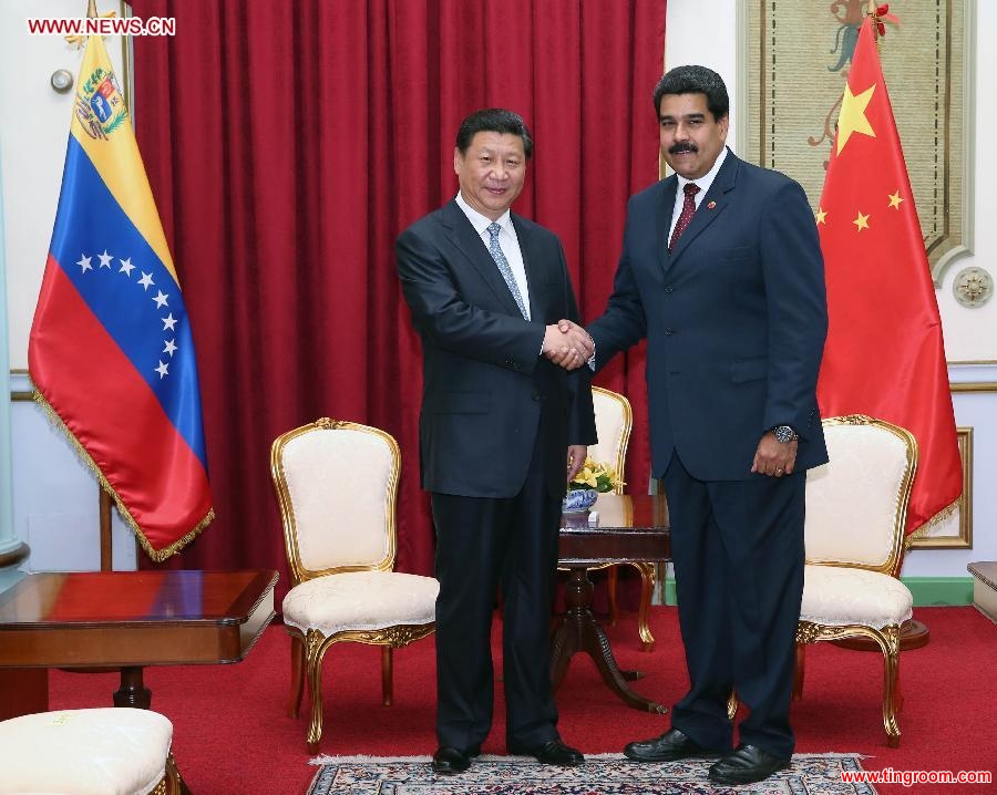 Chinese President Xi Jinping (L) meets with his Venezuelan counterpart Nicolas Maduro in Caracas July 20, 2014. (Xinhua/Lan Hongguang)