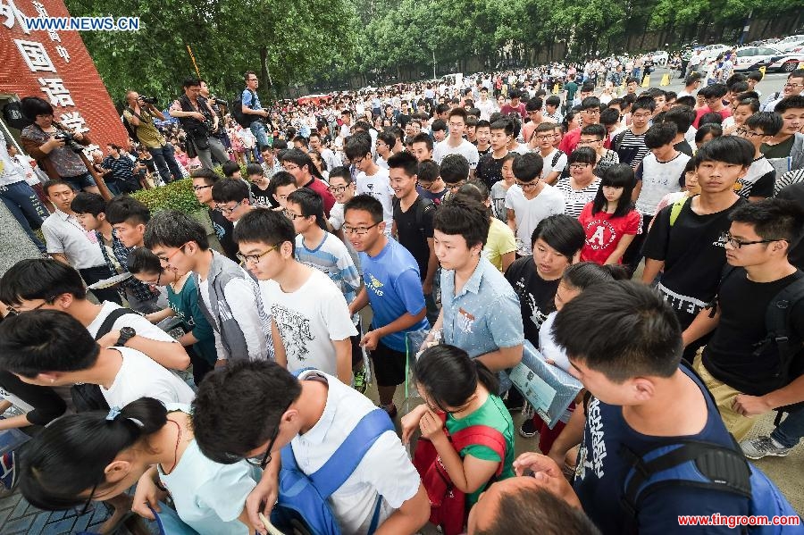 Candidates enter World Foreign Language School for the National College Entrance Exams in Hefei, capital of east China