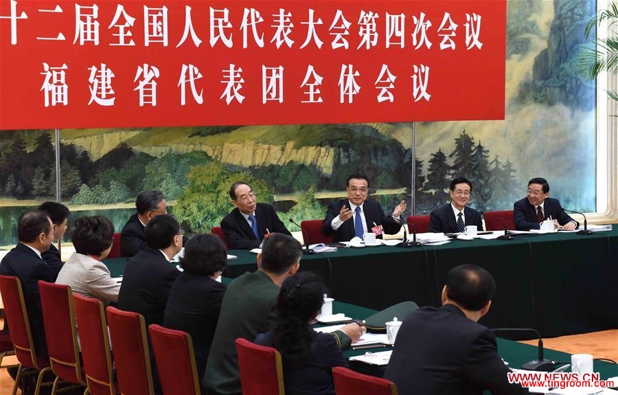BEIJING, March 7, 2016 (Xinhua) -- Chinese Premier Li Keqiang (3rd R, back) joins a group deliberation of deputies from Fujian Province to the annual session of the National People
