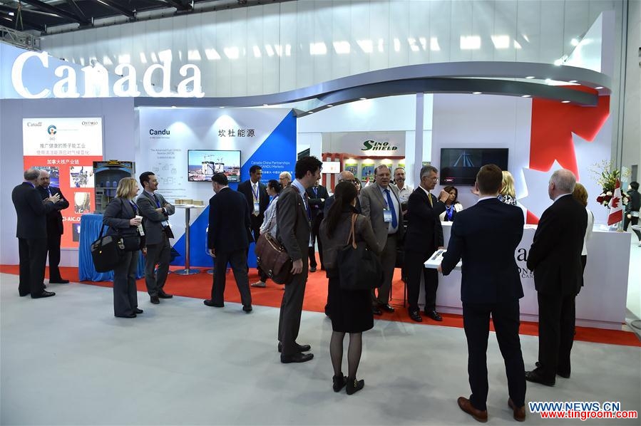 People visit the 14th China International Nuclear Industry Exhibition & the 20th Pacific Basin Nuclear Conference in Beijing, capital of China, April 6, 2016. Some 300 exhibitors from 12 countries participated in the exhibition that opened here on Wednesday. (Xinhua/Li Xin)