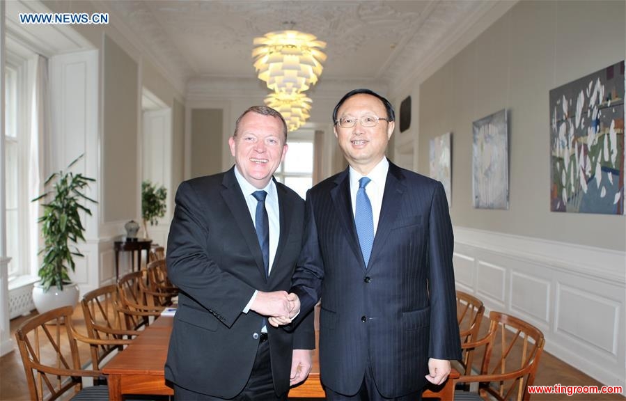 COPENHAGEN, April 17, 2016 (Xinhua) -- Danish Prime Minister Lars Loekke Rasmussen (L) shakes hands with visiting Chinese State Councilor Yang Jiechi during their meeting in Copenhagen, Denmark, April 17, 2016. (Xinhua/Shi Shouhe)