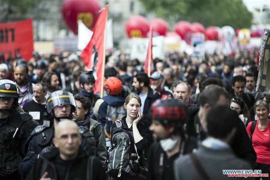 People take to streets to protest against the new labor law in Paris, France on May 17, 2016. In the latest protest against the French government