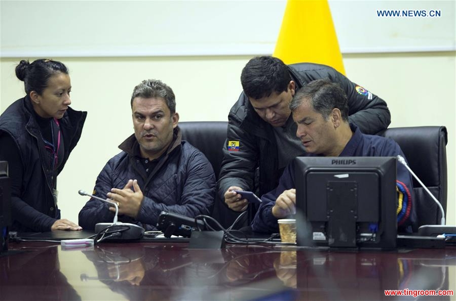 Ecuadorian President Rafael Correa (1st R) meets with members of the Committee of Emergency Operations (COE) after an earthquake at the Integrated Security Service ECU 911 in Quito, capital of Ecuador, on May 18, 2016. An earthquake measuring 6.7 on the Richter scale struck western Ecuador early Wednesday, according to the U.S. Geographical Survey. The powerful quake occurred at 02:57:04 local time (07:57:04 GMT), with the epicenter located about 34 kilometers from Rosa Zarate and 60 kilometers from Esmeraldas at a depth of about 10 kilometers. (Xinhua/Stringer)