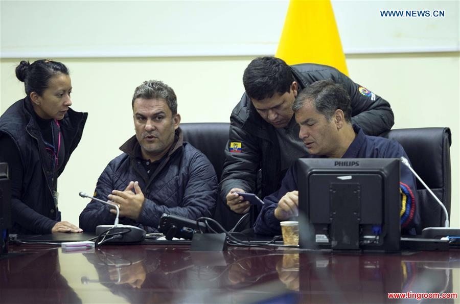 Ecuadorian President Rafael Correa (1st R) meets with members of the Committee of Emergency Operations (COE) after an earthquake at the Integrated Security Service ECU 911 in Quito, capital of Ecuador, on May 18, 2016. An earthquake measuring 6.7 on the Richter scale struck western Ecuador early Wednesday, according to the U.S. Geographical Survey. The powerful quake occurred at 02:57:04 local time (07:57:04 GMT), with the epicenter located about 34 kilometers from Rosa Zarate and 60 kilometers from Esmeraldas at a depth of about 10 kilometers. (Xinhua/Stringer) 