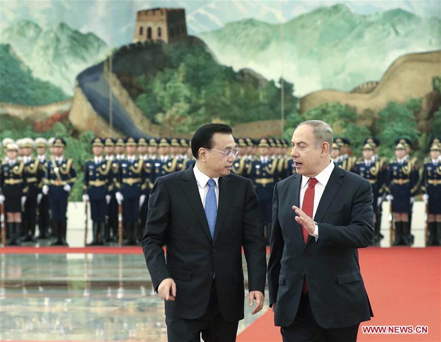 Chinese Premier Li Keqiang (L) holds a welcome ceremony for visiting Israeli Prime Minister Benjamin Netanyahu before their talks in Beijing, capital of China, March 20, 2017. (Xinhua/Pang Xinglei)