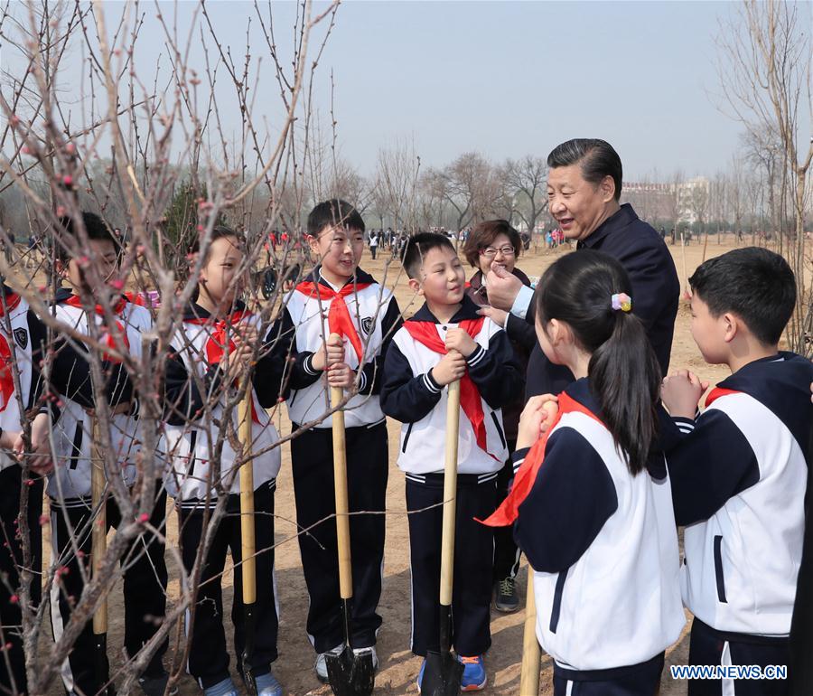 Chinese PresidentXi Jinpingtalks with students as he attends a tree planting activity in Beijing, capital of China, March 29, 2017. China
