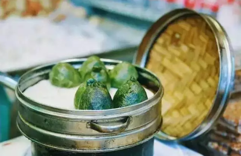 Qingming food: Sweet green rice balls popular in east China