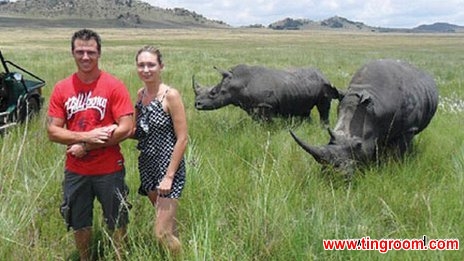 Chantal Beyer posed with her husband Sven Fouche beside the rhinos moments before one of them attacked her 